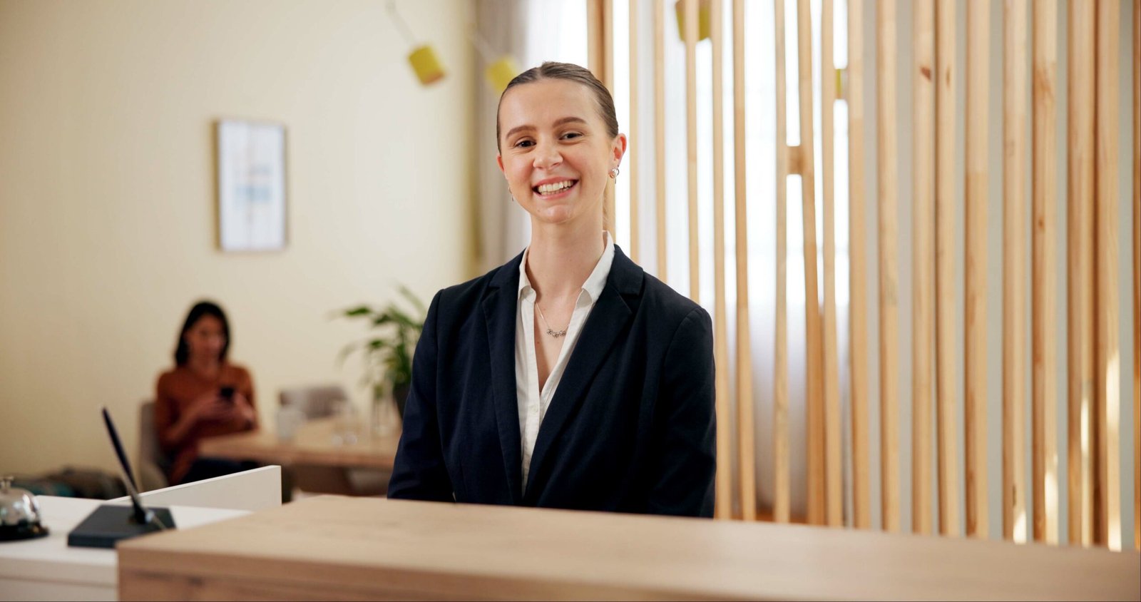 woman-employee-and-happy-as-hotel-receptionist-at-2026-03-25-06-01-49-utc